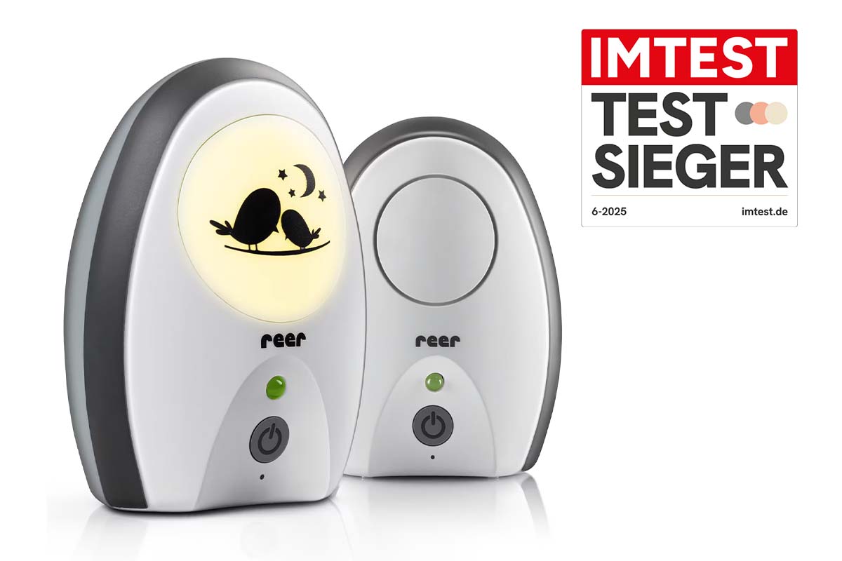 Babyphone auf weißem Grund, dazu Testsieger Siegel